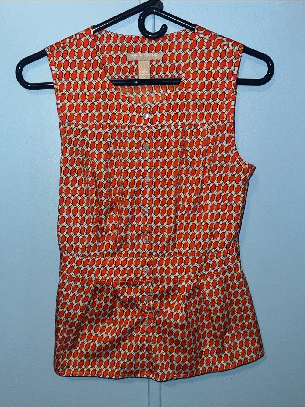 Banana Republic orange and beige geometric pattern blouse with peplum hem